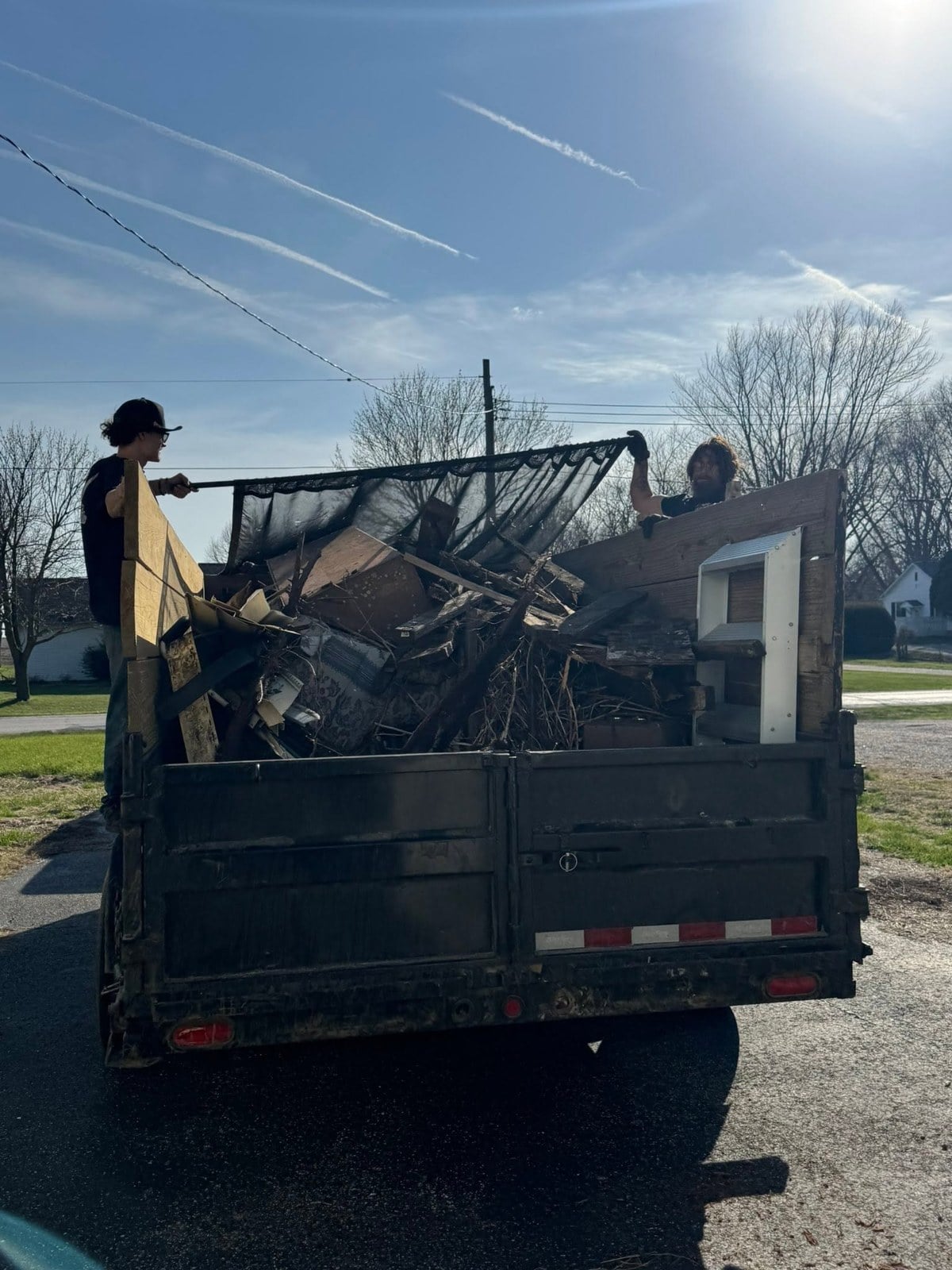 L&J’s crew loading a full dump trailer